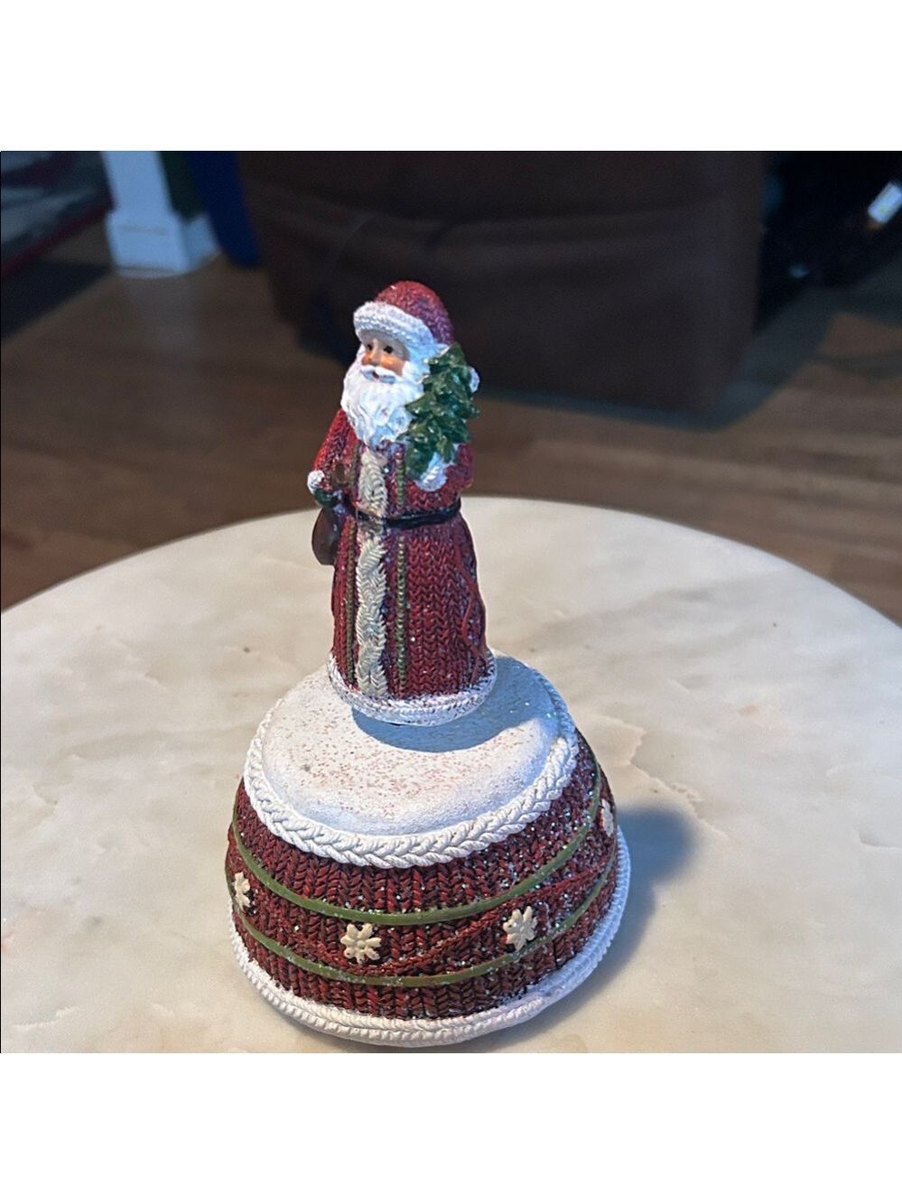 Charming musical Santa figurine that rotates plane Santa Claus is coming to town